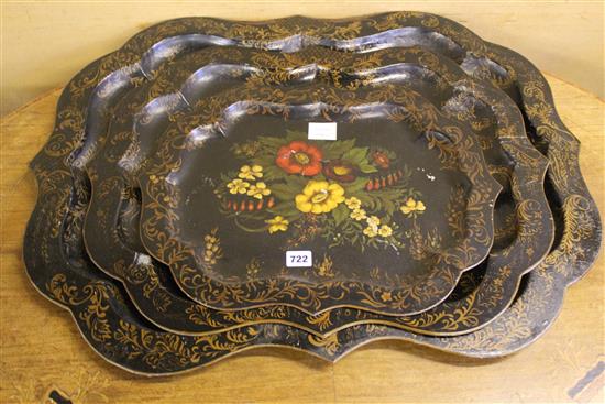 Set of three painted tin trays